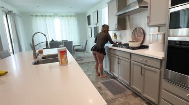 Stepmom cleaning up in the kitchen