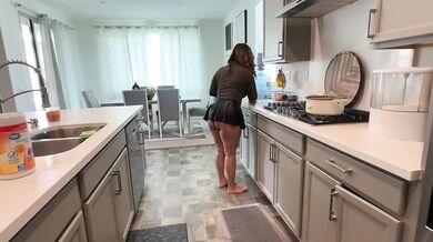 Stepmom cleaning up in the kitchen