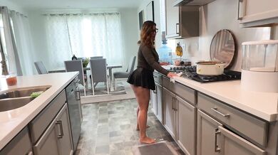 Stepmom cleaning up in the kitchen