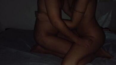 Romantic couple's massage with candles and gliding movements.
