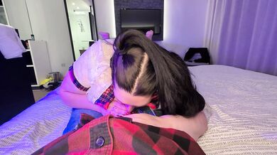 SSBBW in School Uniform talks dirty to the camera while sucking teachers dick