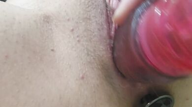 Pink toy for a bit with anal plug