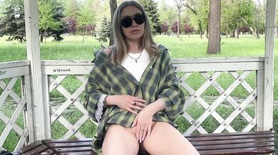 Playing with my pussy in a public park while people walk by. Risky masturbation