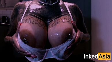 INKED ASIA - OILING MASSIVE NATURAL PORN TITS