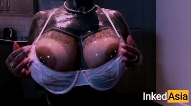 INKED ASIA - OILING MASSIVE NATURAL PORN TITS