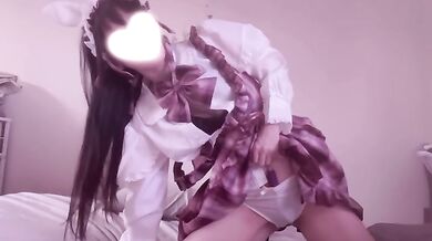 Cute girl with straight black hair indulges in pleasure by masturbation
