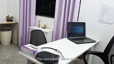 Medical examination of the patient's abdomen in the doctor's office.
