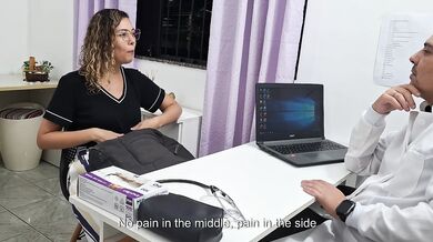 Medical examination of the patient's abdomen in the doctor's office.