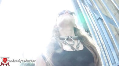 Outdoors locked in a chastity belt and plugged