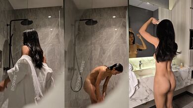 ASIAN_SEXDOLL RELAXES UNDER WARM SHOWER LIGHT