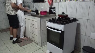 Maid had her ass used while washing dishes.
