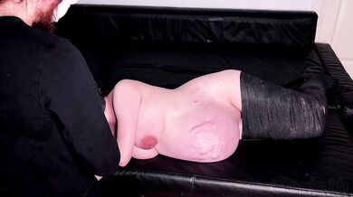 Huge pregnant MILF Lily Corinth is partly mummified with black gauze and gives immobilized blowjob
