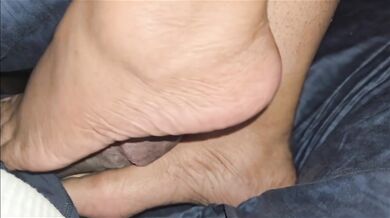 Her soles drain my dick