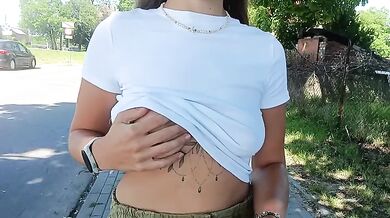 flashing her tits in the city caught showing her breasts