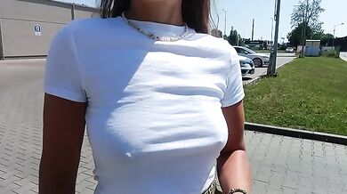 flashing her tits in the city caught showing her breasts