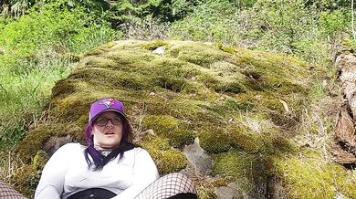 Milf dildo fucks herself beside public waterfalls