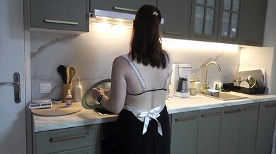 Maid's beautiful feet are brought to a cumshot by doing a footjob