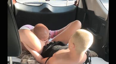 Sneaky knee deep in the passenger seat lesbian car fun