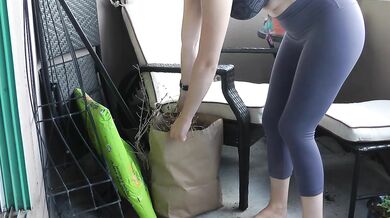 Wetting my tight yoga pants while trying to clean the balcony