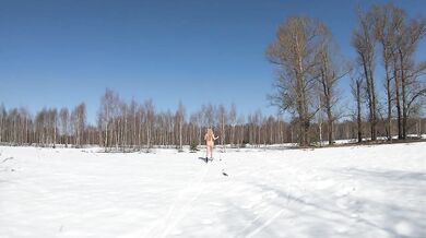 Naked girl nudism on skis