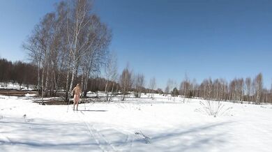 Naked girl nudism on skis