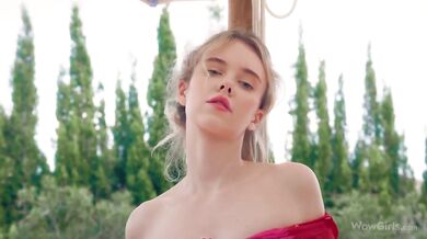 Blonde Kira Kyox solo fingering makes her pussy wet outdoors