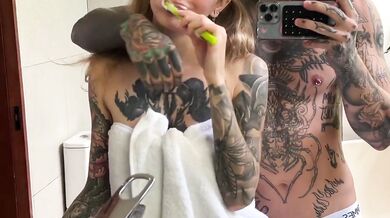 Tattooed blonde deep throats with tease eyes