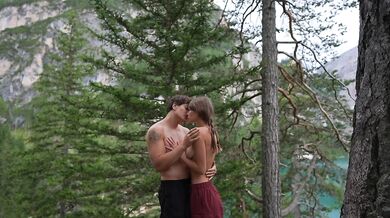 Wild forest passion intense couple making love outdoor romantic cinematic