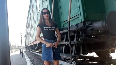 Russian brunette walks skirtless flashing pussy at train station