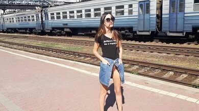 Russian brunette walks skirtless flashing pussy at train station