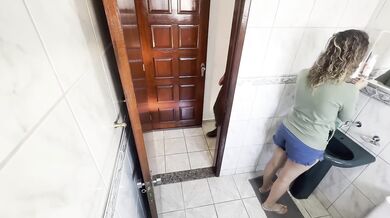Stepniece rubs against him in bathroom caught on tape