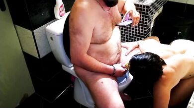 Submissive redhead with huge tits gets used as a human toilet and drinks piss