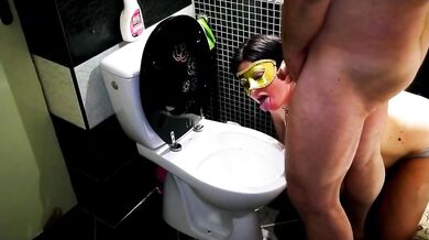 Submissive redhead with huge tits gets used as a human toilet and drinks piss