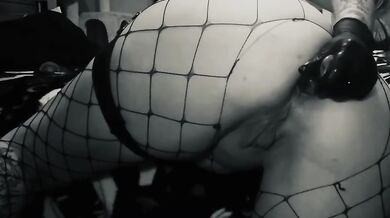 Tight ass stuffed raw with latex gloves and anal plugs choked full