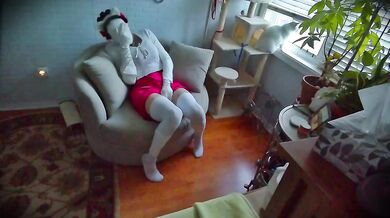 Maid’s Rubber Mask Fetish: She plays with her tight kitty body while wearing a faceless doll suit