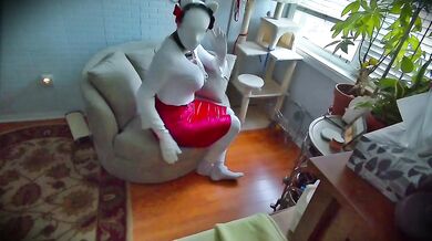 Maid’s Rubber Mask Fetish: She plays with her tight kitty body while wearing a faceless doll suit