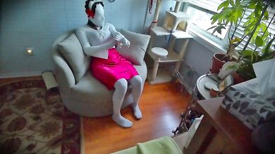 Maid’s Rubber Mask Fetish: She plays with her tight kitty body while wearing a faceless doll suit