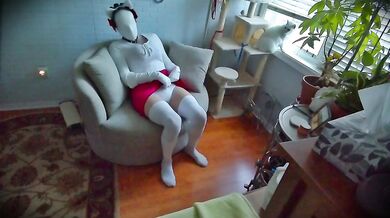 Maid’s Rubber Mask Fetish: She plays with her tight kitty body while wearing a faceless doll suit