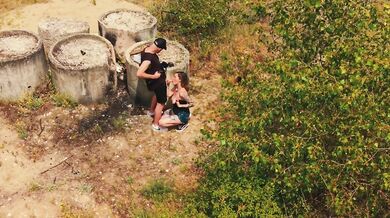 Hot milf gets caught on drone sucking young stud's cock and gags on cum
