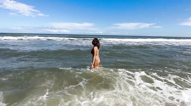 126 D tanned asian milf gets creampie on the beach washes cum off