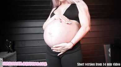 Pregnant blonde in tight sport leggings chokes on her huge belly