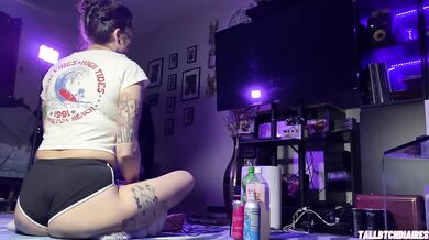 Big Ass Tomboy in dolphin shorts playing Drakengard while fingering her tight feet