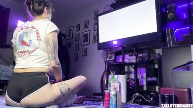 Big Ass Tomboy in dolphin shorts playing Drakengard while fingering her tight feet