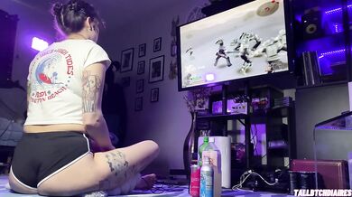 Big Ass Tomboy in dolphin shorts playing Drakengard while fingering her tight feet