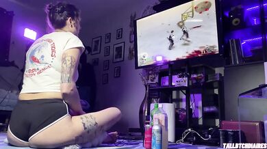 Big Ass Tomboy in dolphin shorts playing Drakengard while fingering her tight feet