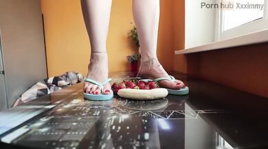 Strawberry delight squished under my flip flop feet