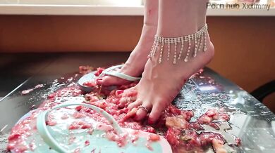 Strawberry delight squished under my flip flop feet