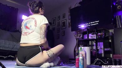Big Ass Tomboy in Dolphin Shorts demolishes Metal Gear Solid 2 with Thick Thighs splayed