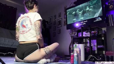 Big Ass Tomboy in Dolphin Shorts demolishes Metal Gear Solid 2 with Thick Thighs splayed