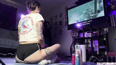 Big Ass Tomboy in Dolphin Shorts demolishes Metal Gear Solid 2 with Thick Thighs splayed